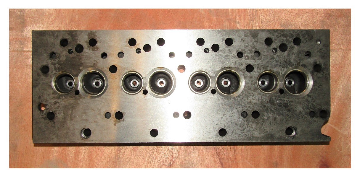 Головка блока цилиндров Yangdong Y4100D (без клапанов /шпилек) /Cylinder head